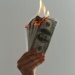 illustrational picture of burning dollars