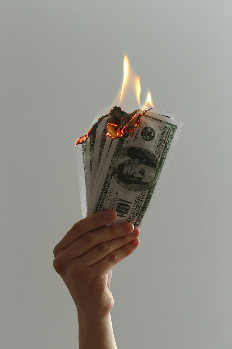 illustrational picture of burning dollars